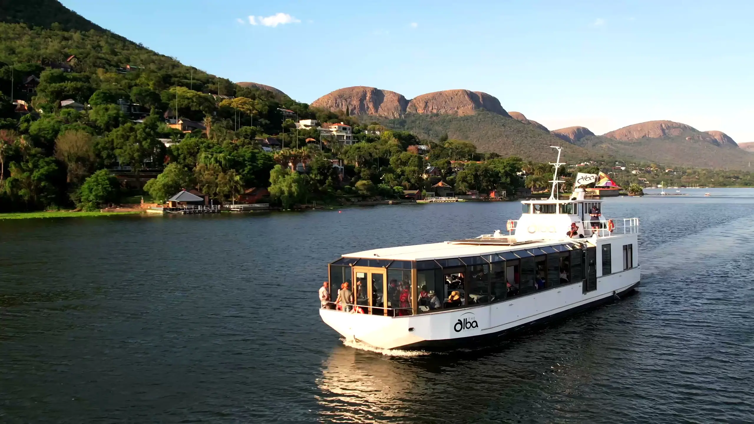 The Alba cruising past the Magaliesberg cliffs