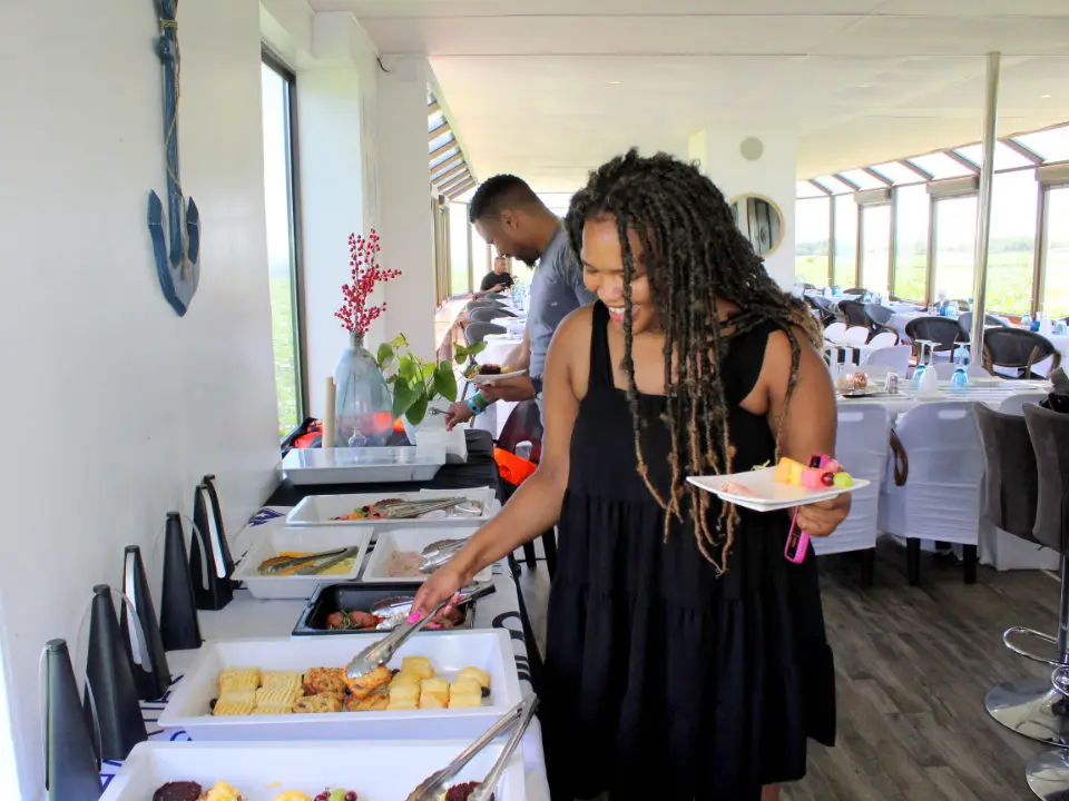 A guest helping herself at the buffet