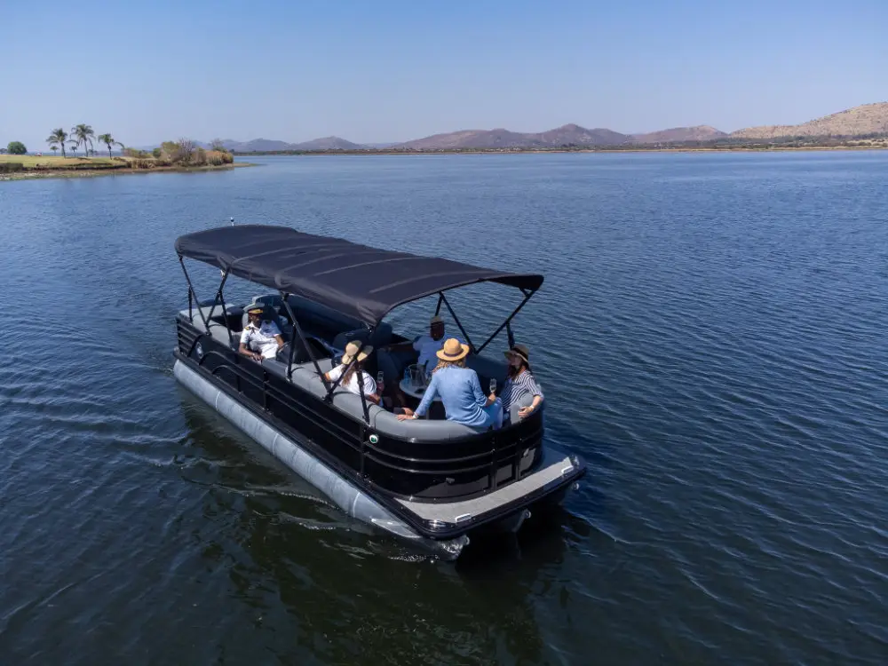 A pontoon crossing the dam from above