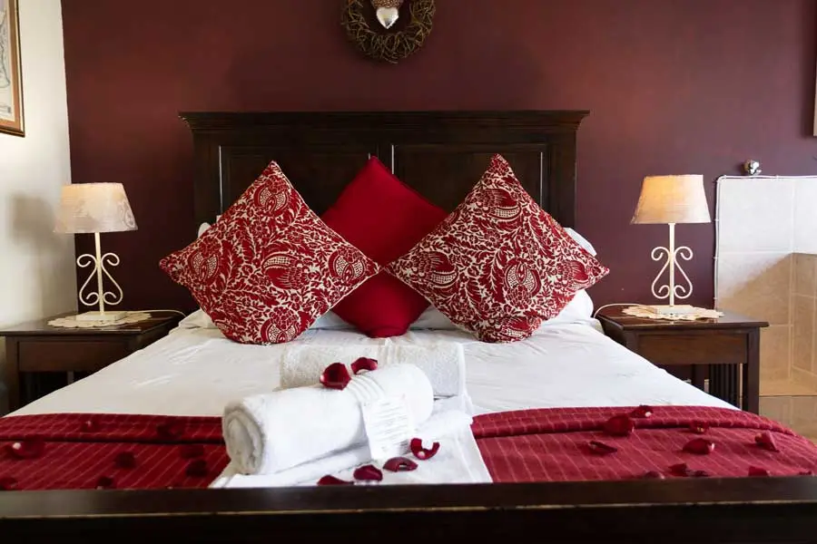 A double room at La Dolce Vita, set with roses